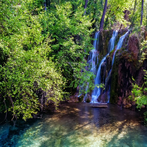 Bathing in the cool waters of the emerald lake Skra